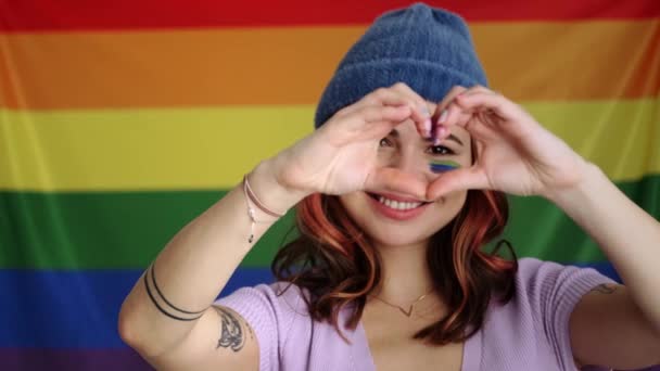 Positive Young Woman Showing Heart Sign Standing Isolated Rainbow Flag — Stock Video