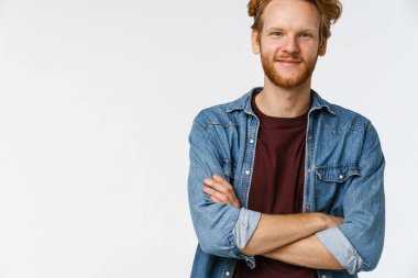 Portrait of happy smiling man isolated on white background, arms folded