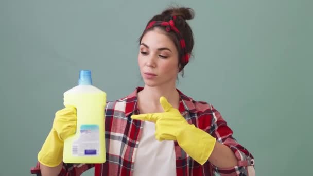 Smiling Cleaner Woman Holding Cleaner Bottle Showing Thumb Gesture Standing — Stockvideo