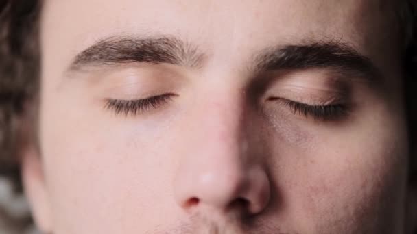 Close View Calm Young Man Opening His Eyes Looking Camera — Stockvideo