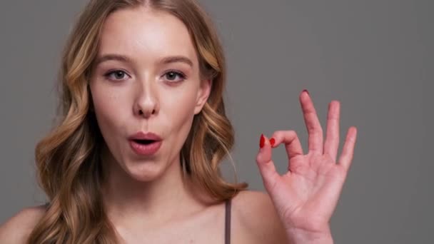 Happy Young Woman Doing Gesture Camera Standing Isolated Gray Background — Stock Video