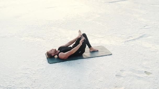 Calm Young Athlete Stretching His Legs Lying Outdoors Yoga Mat — Αρχείο Βίντεο