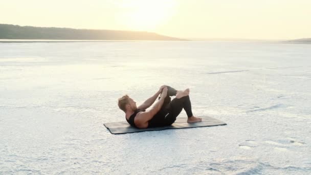 Attractive Young Athlete Stretching His Legs Lying Outdoors Yoga Mat — Vídeo de Stock