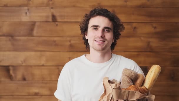 Smiling Man Bread His Hands Raising His Thumb Showing Side — Stock videók