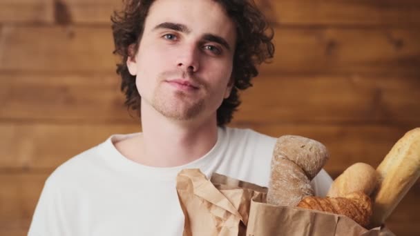 Close View Smiling Man Holding Bread Croissants Showing Okay While — Stock videók