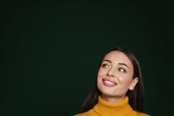 Joyful Beautiful Caucasian Girl Smiling Looking Upward Isolated Green Background — Stock Photo, Image