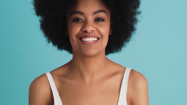 Portrait Smiling Black Woman Showing Peace Gesture Camera Studio – Stock-video