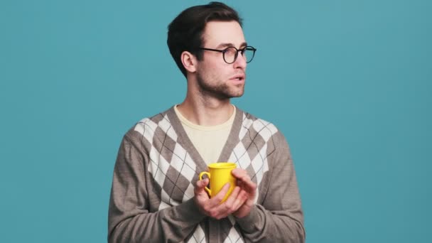 Confused Man Glasses Deciding Cheer While Jumping Place Cup His — 图库视频影像