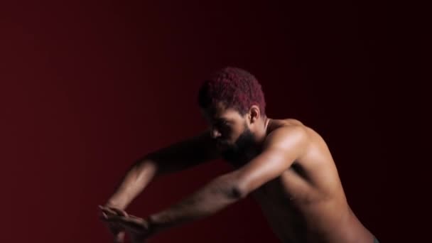 Focused Bearded Half Naked Afro American Man Doing Stretching Exercises — Vídeo de Stock