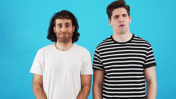 Two Men Shirts Agreed Saying Nodding Heads Blue Studio — Stock videók