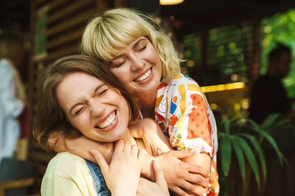 Image Delighted Beautiful Two Women Laughing Hugging While Resting Street — Stock Photo, Image