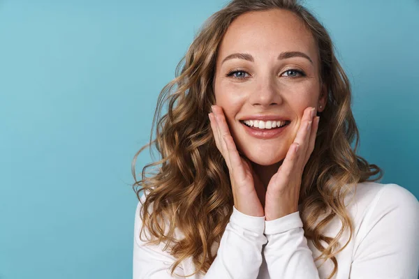 Blonde Young Woman Smiling Looking Camera Isolated Blue Wall — Stock Photo, Image