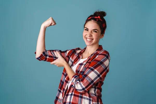 Happy Beautiful Brunette Girl Smiling Showing Her Bicep Isolated Blue — ストック写真