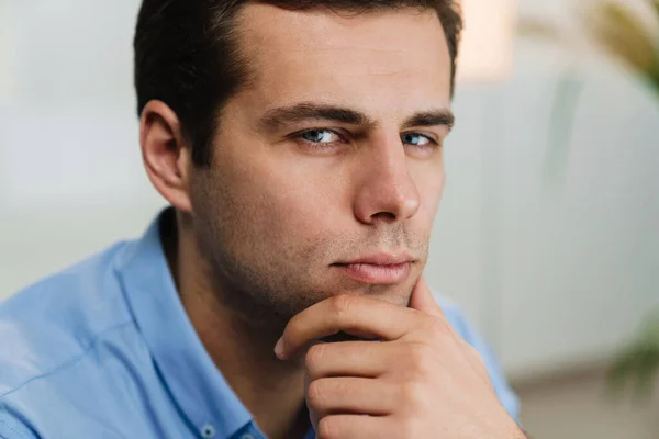 Close Pensive Attractive Young Business Man Looking Camera Indoors — Stock Photo, Image