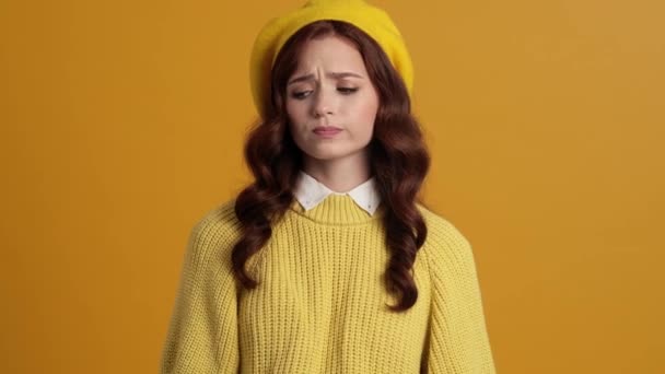 Upset Woman Looking Sides While Standing Crossing Arms Yellow Studio — Stock Video