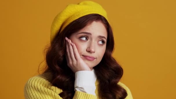 Portrait Tired Woman Looking Sides While Standing Yellow Studio — Stock Video