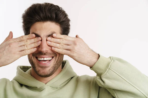 Cheerful Handsome Man Sportswear Covering His Eyes Isolated White Background — 图库照片