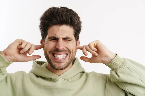 Displeased Handsome Man Sportswear Plugging His Ears Isolated White Background — Stock Photo, Image