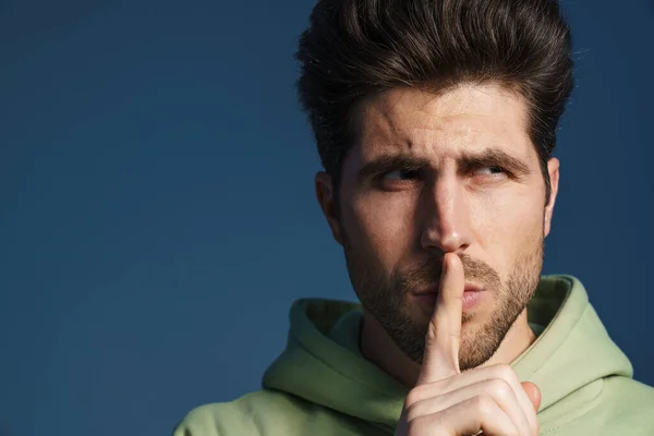 Tense Handsome Man Sportswear Showing Silence Gesture Isolated Blue Background — Stock Photo, Image