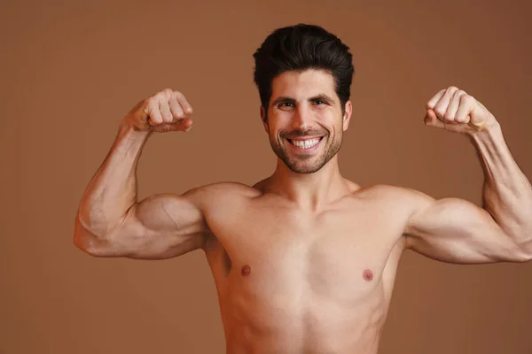 Shirtless Happy Man Smiling Showing His Biceps Camera Isolated Beige — Stock Photo, Image