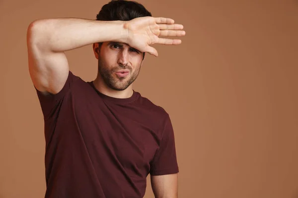 Displeased Young Man Headache Touching His Forehead Isolated Beige Background — Stock Photo, Image