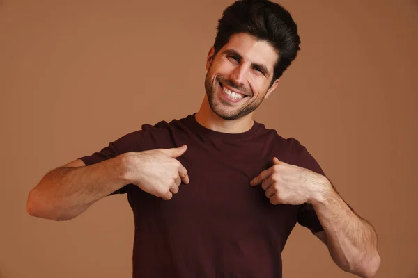 Happy Masculine Young Man Smiling Pointing Fingers Himself Isolated Beige — Stock Photo, Image