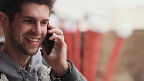 Close View Smiling Man Hoodie Denim Jacket Talking Phone While — Stock Video