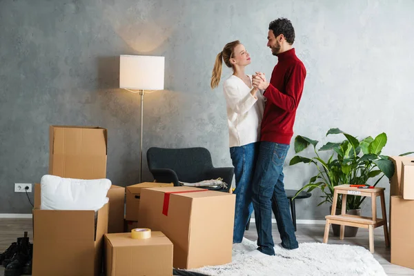 Portrait Smiling Couple Moving Together New House Surrounded Boxes Dancing — Stock Photo, Image
