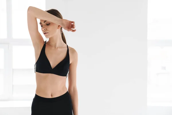 Tired Young Sportswoman Resting While Working Out Indoors — Stock Photo, Image