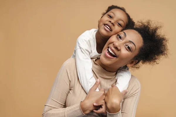 Happy Black Mother Daughter Hugging While Making Fun Together Isolated — Stock Photo, Image