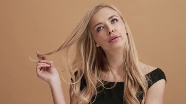 Displeased Blonde Woman Looking Camera Standing Isolated Beige Wall Studio — Stock Video