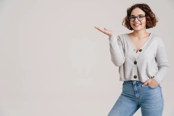 Happy Smiling Beautiful Young Woman Presenting Looking Copyspace Isolated White — Stock fotografie