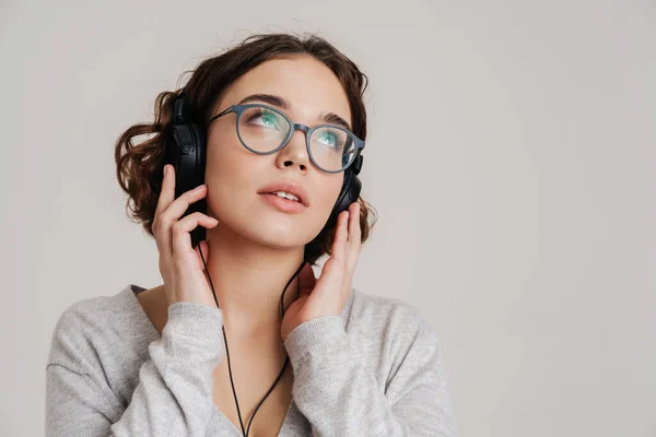 Lovely Young Woman Listening Music Headphones Isolated White Background — Stok fotoğraf