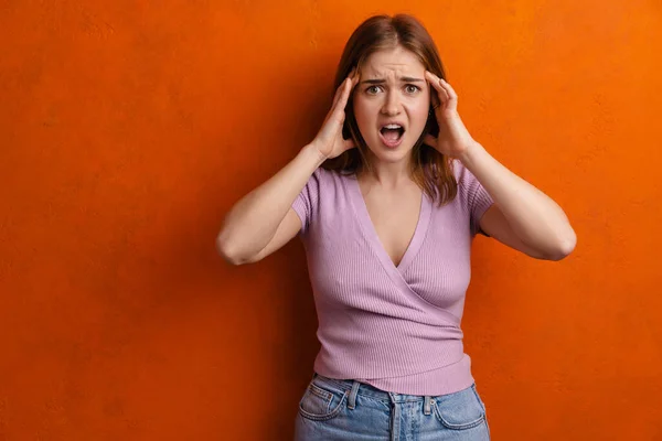 Young Ginger Displeased Woman Headache Rubbing Her Temples Isolated Orange — Stock Fotó