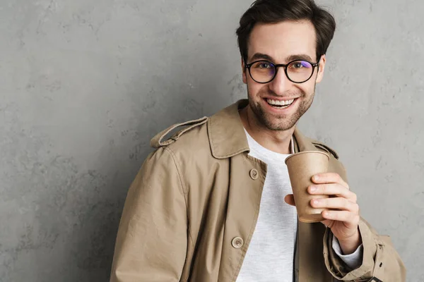 Handsome Man Wearing Stylish Coat Posing Isolated Gray Background Drinking — Stock Photo, Image