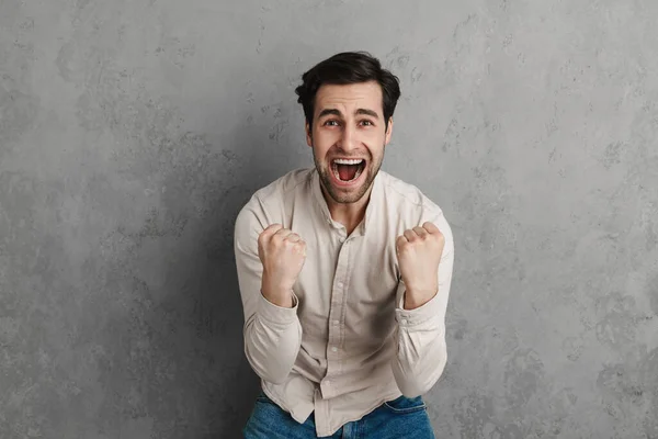 Glad Stilig Ung Man Casual Outfit Firar Framgång Isolerad Över — Stockfoto