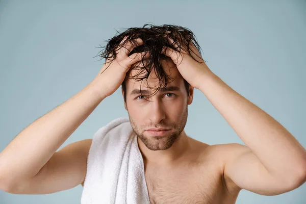 Shirtless White Man Touching His Hair Looking Camera Isolated Blue — ストック写真