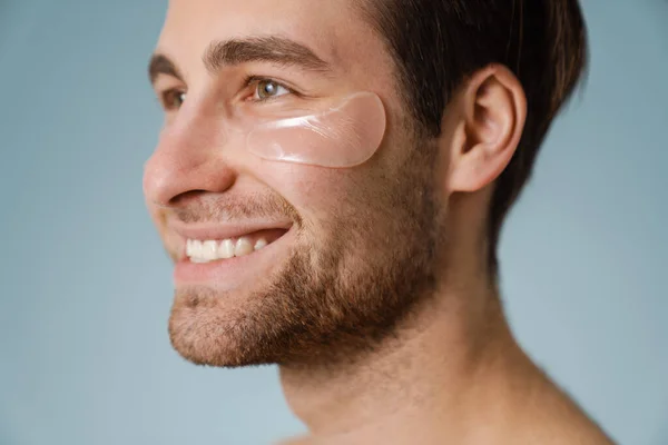 Shirtless White Man Eye Patches Smiling Looking Aside Isolated Blue — Stock Photo, Image