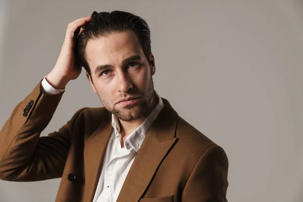 Unshaven Brunette Man Jacket Posing Looking Camera Isolated Grey Background — Stock Fotó