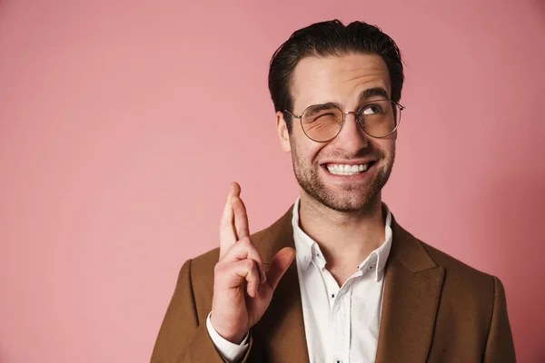 Unshaven White Man Winking While Holding Fingers Crossed Good Luck — Stock Photo, Image