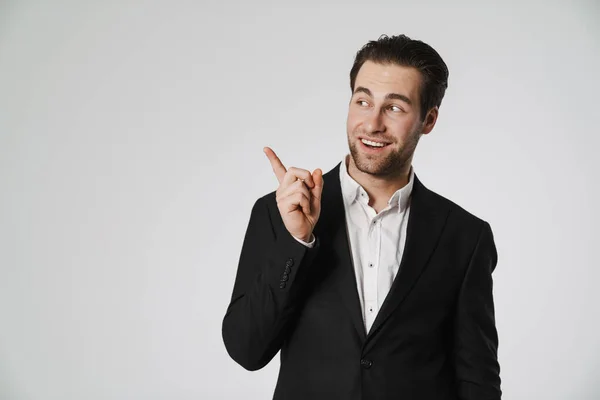 Unshaven Brunette Man Jacket Smiling Pointing Finger Aside Isolated White — Stock Photo, Image