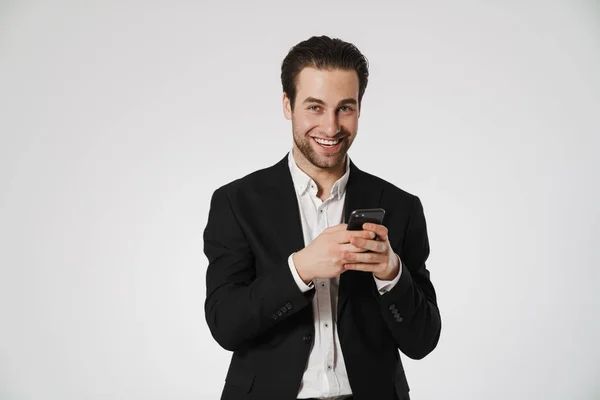 Unshaven Brunette Man Jacket Smiling Using Cellphone Isolated White Background — Stock Fotó