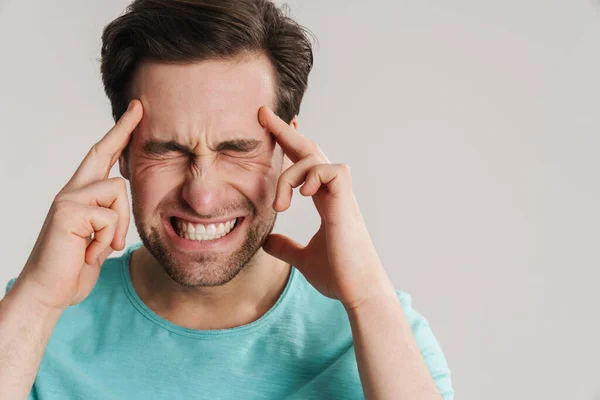 Stressed Upset Man Suffering Strong Migraine Isolated Gray Background — Stock Photo, Image