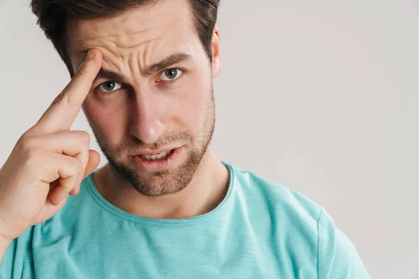 Displeased Handsome Guy Rubbing His Forehead Looking Camera Isolated White — Stock Photo, Image