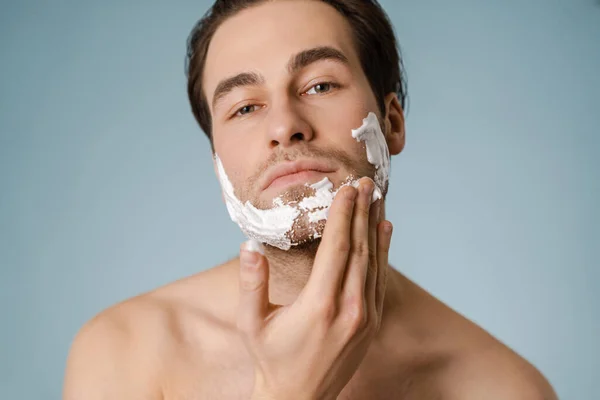 Attractive Young Smiling Nude Man Shaving Foam His Face Isolated Stock Picture