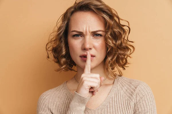 Displeased Ginger Woman Wavy Hair Showing Silence Gesture Camera Isolated — Stock Photo, Image