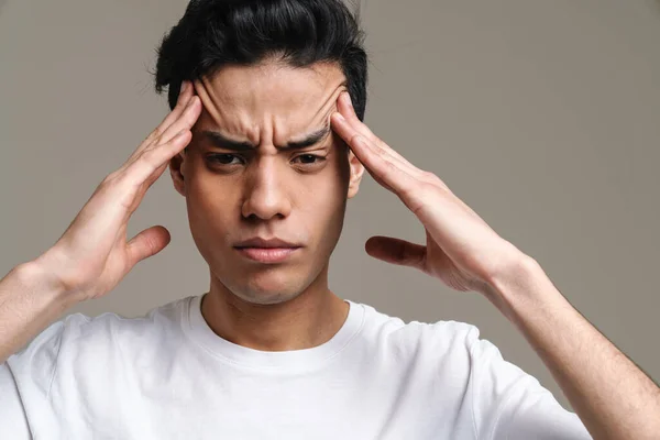 Pensive Frowning Young Brunette Man Shirt Standing Gray Wall Background — Stock Photo, Image