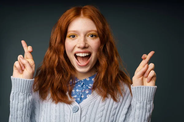 Young Ginger Excited Woman Holding Fingers Crossed Good Luck Isolated — Stock Photo, Image