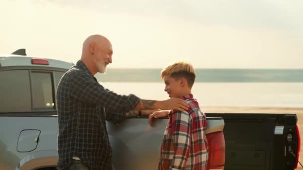 Positive Father Clapping Shoulder His Son Standing His Car While — Stock Video