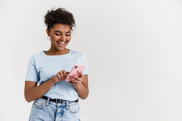 Young Black Woman Shirt Smiling While Using Mobile Phone Isolated — Fotografia de Stock